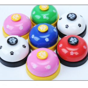 Colorful dog training bells with paw prints and measurements on a white background