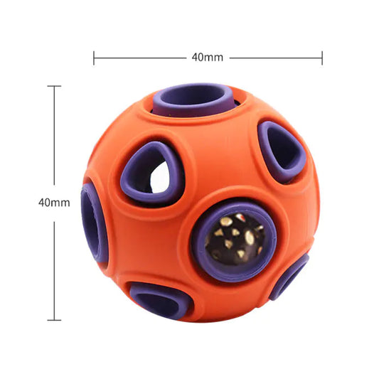 Orange and purple ball-shaped puzzle toy with measurements on a white background