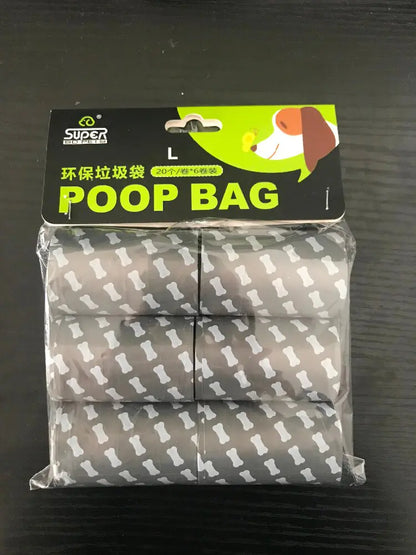 Pack of dog poop bags with packaging label on a dark surface